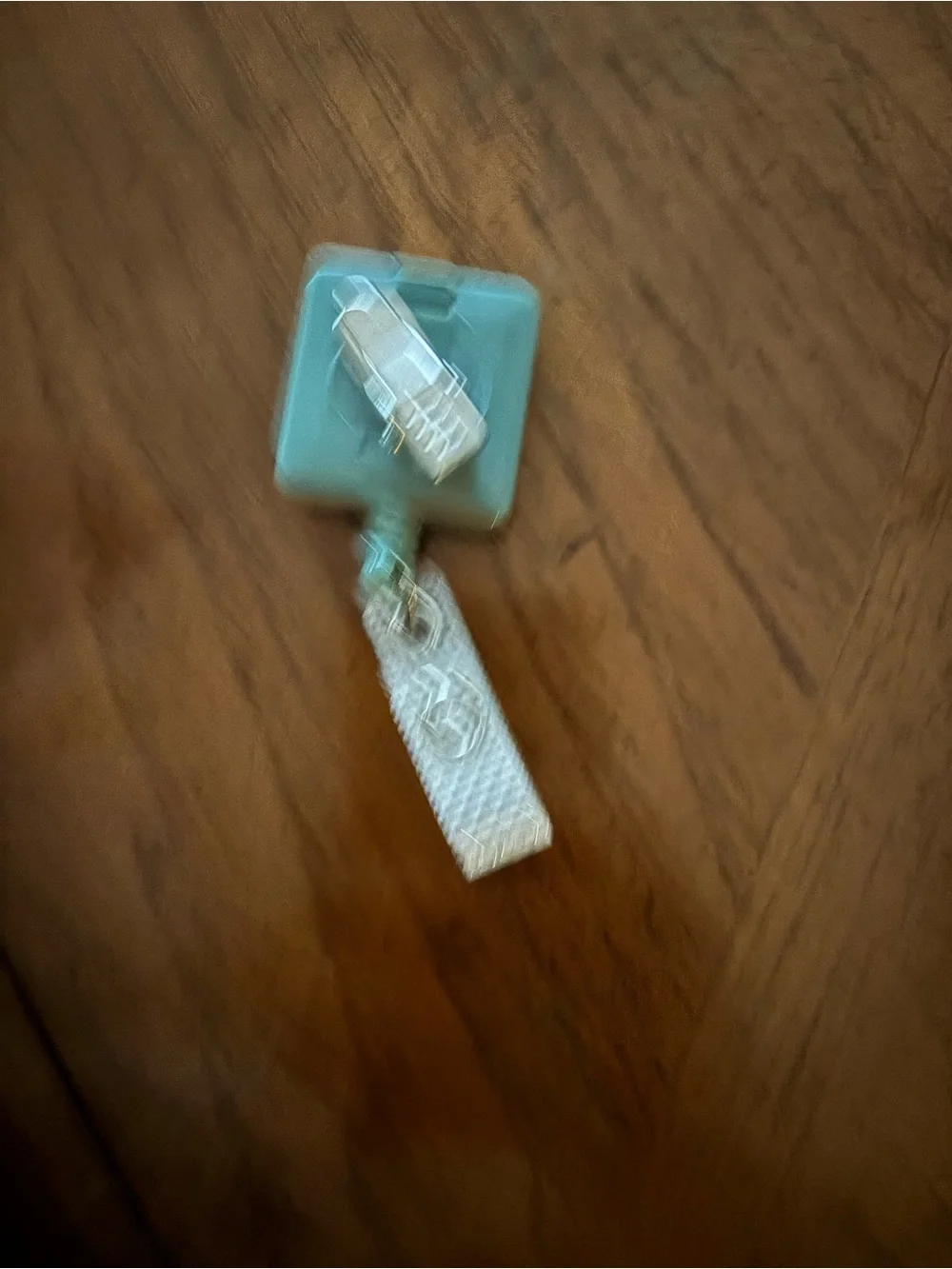 FIGS Mint Green Clip-On Headset Accessory with Tooth Logo